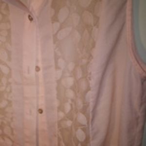 Sleeveless lace shell.